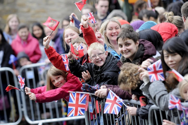 Crowds wait to see the Queen during her trip to Lancaster and Bilsborrow in 2015.