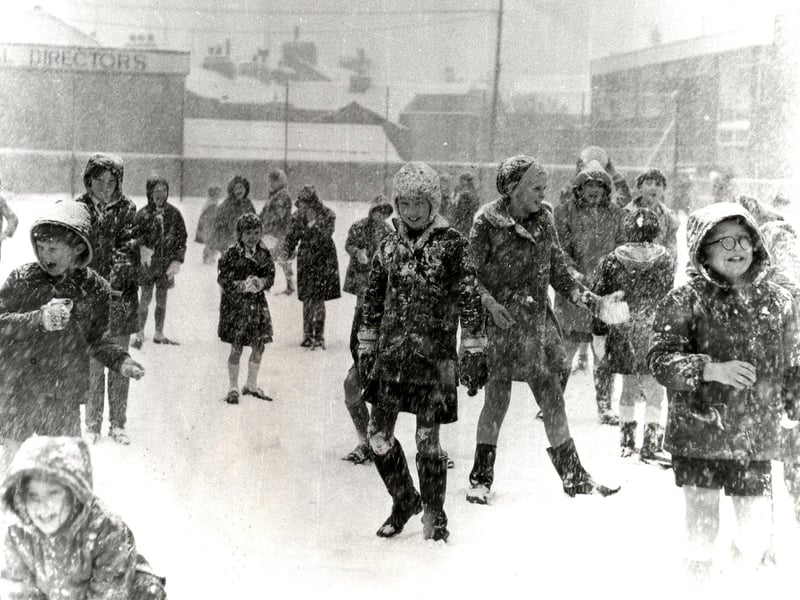 Children playing in the snow at Sandylands School in 1969.