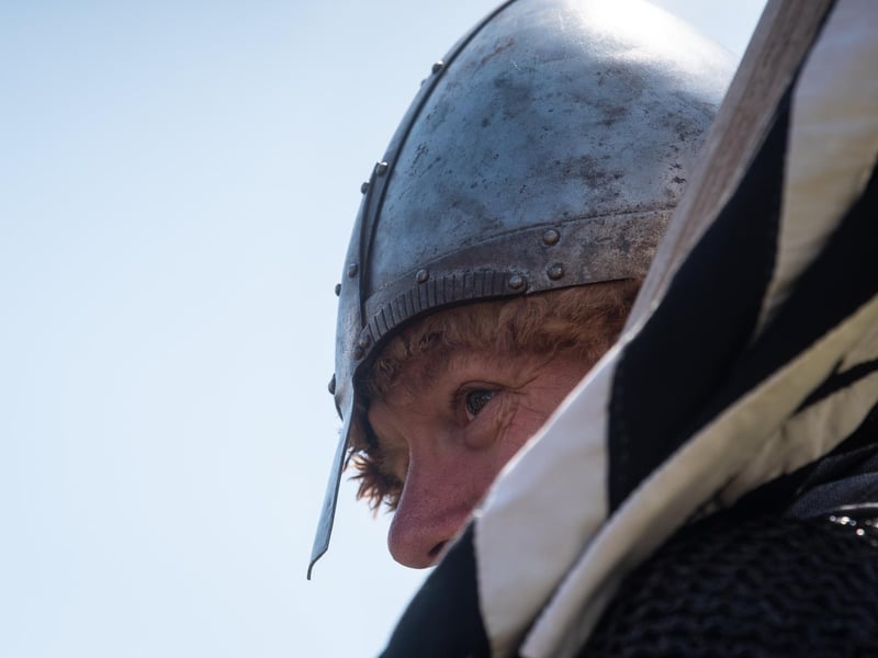 Heysham Viking Festival 2026 - a Viking with a helmet and a flag.