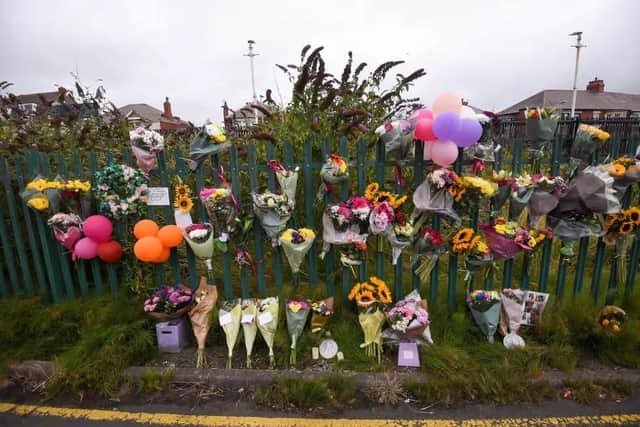 Floral tributes to Kiena Dawes outside her mum's house in Carlyle Avenue, Blackpool