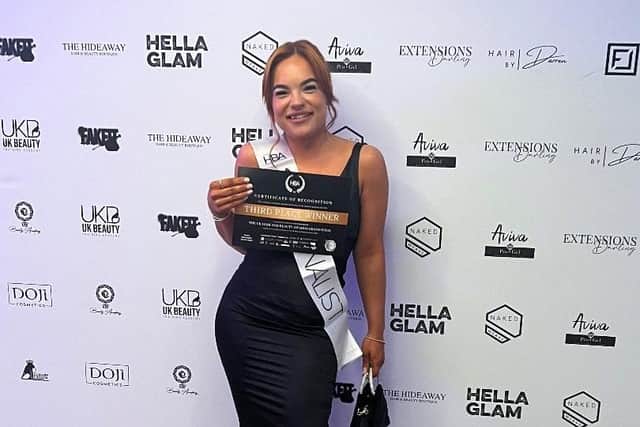 Natalie Eastwood at the red carpet event in Birmingham with her certificate as a third place winner in the UK Hair and Beauty Awards.
