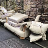A Morecambe town councillor is appealing for information about who flytipped some furniture on a back street in Morecambe.