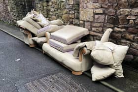 A Morecambe town councillor is appealing for information about who flytipped some furniture on a back street in Morecambe.