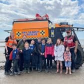 Silverdale St John's pupils with the new rescue vehicle.