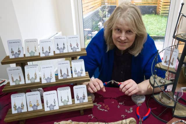 Kay Dickinson making her chain mail jewellery.