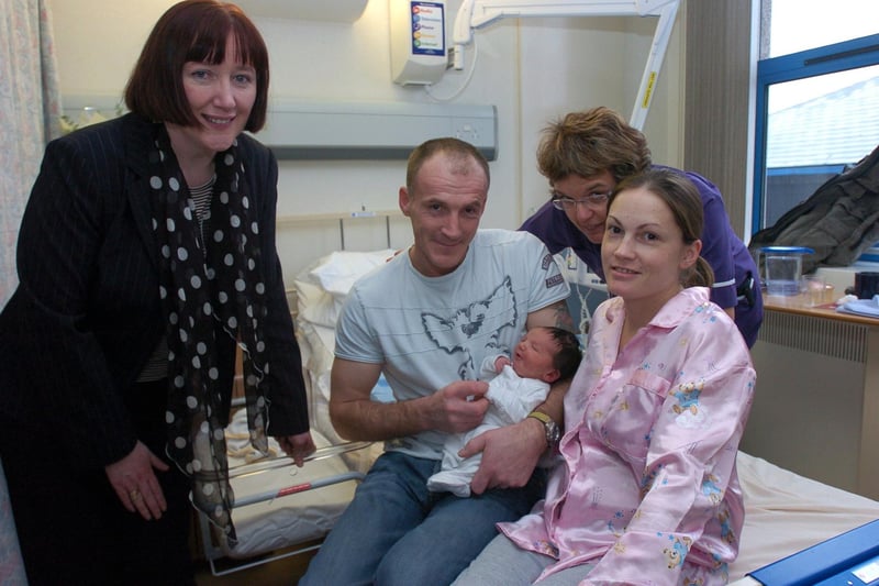 Geraldine Smith, MP for Morecambe and Lunesdale, meets Graeme and Caro Sim with their new baby son, Joshua, and matron and midwife Sharon Hayes in the maternity unit at the Royal Lancaster Infirmary during the MP's Christmas visit to the hospital.