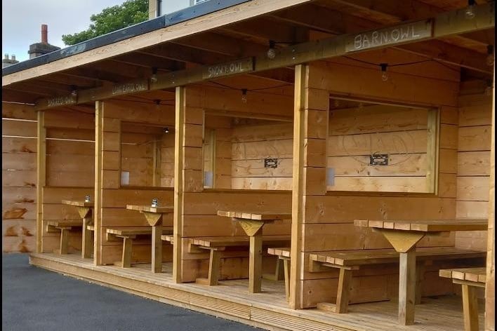Lots of outdoor seating including fabulous wooden booths. Little Pizza Box visits outside the pub on certain dates if you get peckish.