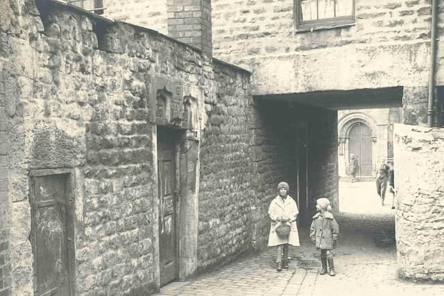 Swan Court off St Leonard's Gate is an example of one of the lanes in the Mill Race area. Image courtesy of Lancaster City Museums.