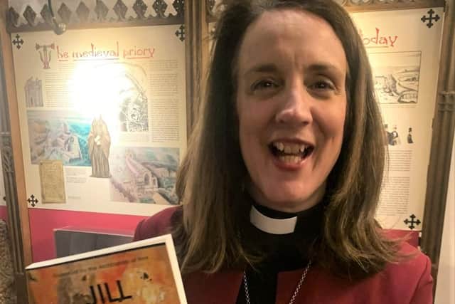 Bishop Jill with her new book, 'Lighting the Beacons'.
