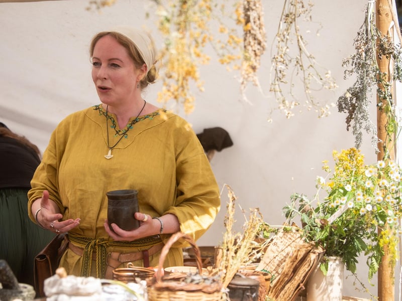 Heysham Viking Festival 2026 - a woman at a traditional stall at the festival.