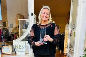 Tiffany Moore at Renes in Common Garden Street, Lancaster, with the award.