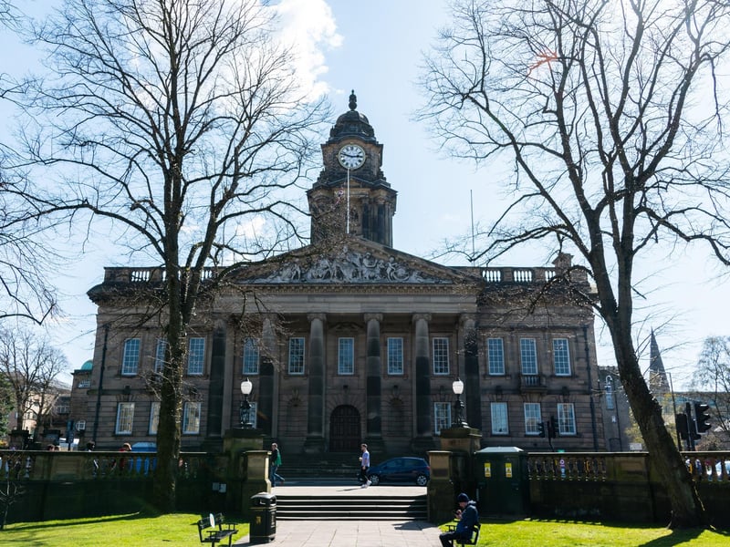 Lancaster Town Hall was officially opened on December 27 1909 by Lord Ashton. It replaced the existing town hall, now the city museum in Market Square, as the then Lancaster Corporation had outgrown the building. The corporation was unable to finance a new building but Lord Ashton offered to pay for a new municipal building. 
The construction began in 1906 with Waring & Gillow the main contractors for the stone work, furniture and wood carvings. The stone carving over the front steps was undertaken by F W Pomfrey and the stained glass windows were made by local firm Shrigley and Hunt. The final cost of the complete works, which also included a redevelopment of Dalton Square and the erection of a statue of Queen Victoria, was £155,000.