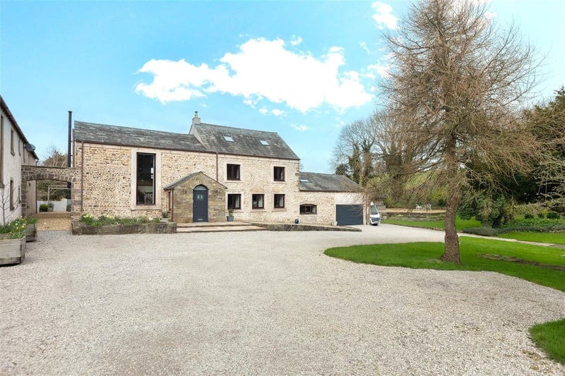 This impressive five bedroom farmhouse dates all the way back to 1675.