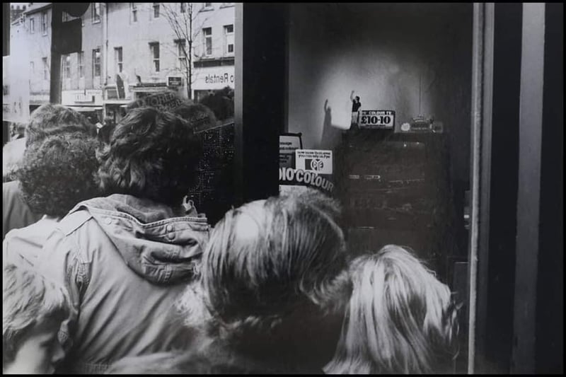 Crowding round a Lancaster television shop in the Seventies to watch a football match. Picture: Alister Firth