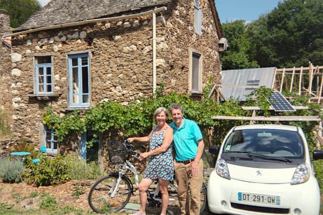 Ann and Tom at their off grid house in France.