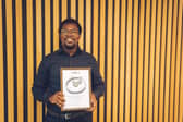 Dr Yakubu Salifu with his award.