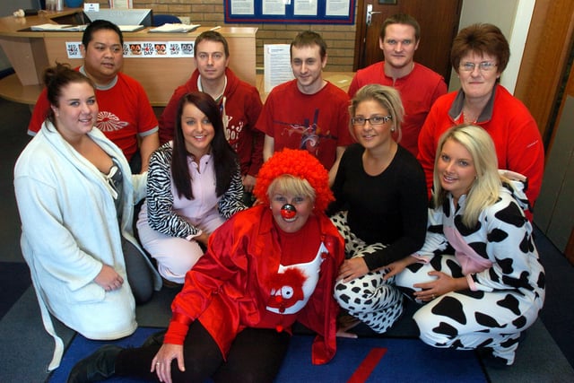 Staff from AXA Insurance raised money for Comic Relief on Red Nose Day 2011 with a dress down day, raffle and the sale of cakes made by staff and 13-year-old Rosie Melrose.