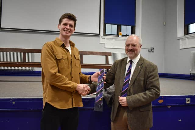 Actor Joel Phillimore is given an honorary Expressive Arts tie by Head of Art Mr Bagnold, who taught him Joel when he was at LRGS.