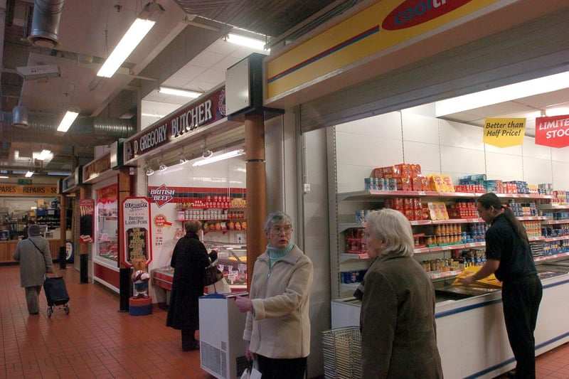Customers shop at Lancaster Market.