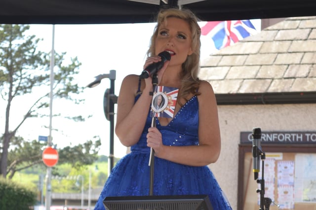 Entertaining the crowds at Carnforth's coronation party.