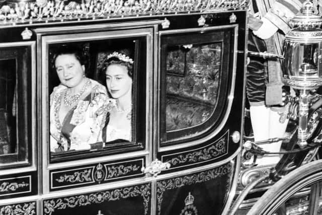 Princess Margaret (R) and Queen Elizabeth The Queen Mother (L), on June 2, 1953 in London in the horse-drawn carriage for the coronation of Queen Elizabeth II. (Photo by INTERCONTINENTALE / AFP) (Photo by -/INTERCONTINENTALE/AFP via Getty Images)