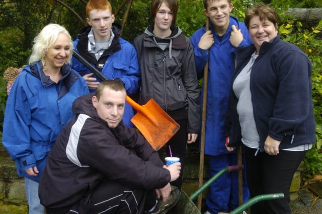 Lancaster & Morecambe College E2E students Ashley Stebbing, Jade Hewitison, Jake Woodhead and Shaun Walker with tutors Cathy Stewart and Janet Hargreaves help clean Williamson Park as part of their course.