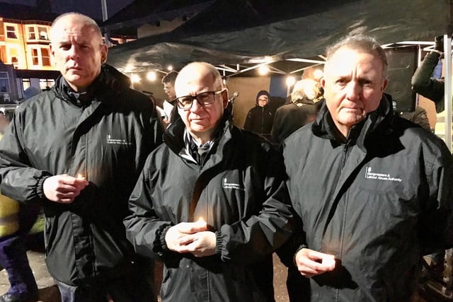 Representatives of the Gangmasters and Labour Abuse Authority at the memorial event on Morecambe promenade.