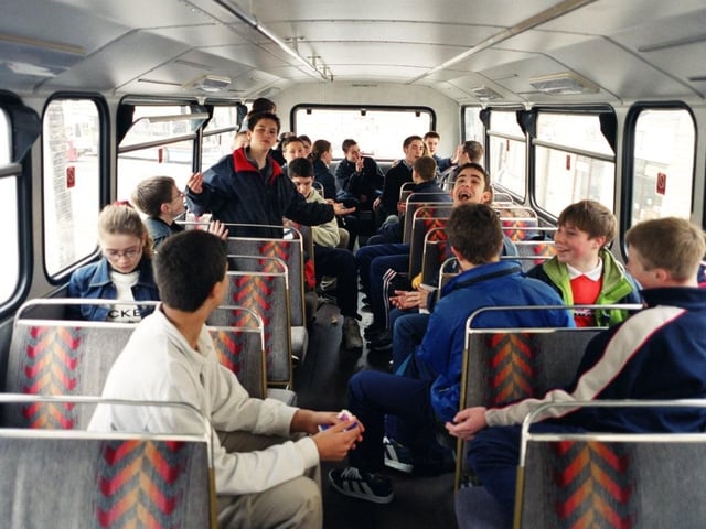 Rowdy schoolboys make their way home aboard a Stagecoach bus in 2000. Photo by D J Clark.