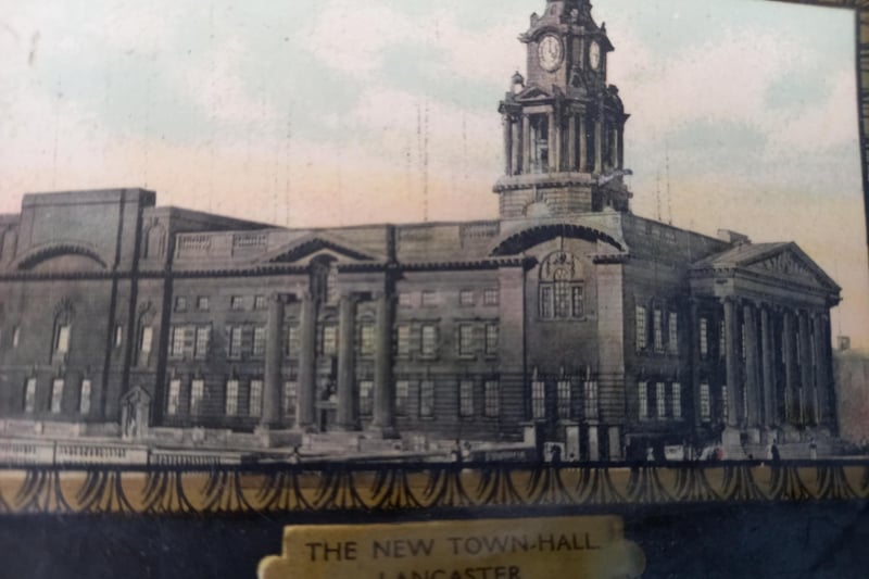 A side view of the then relatively new Lancaster Town Hall, built in 1909. The building was commissioned to replace the aging town hall, now the City Museum, in Market Square. The new building was designed by Edward Mountford and Thomas Lucas in the Edwardian Baroque style and the stonework, furniture and carvings were undertaken by Waring & Gillow. It  accommodated a police station in the basement and a magistrates' court on the ground floor and it included an assembly hall, to the rear of the main building, which became known as the Ashton Hall.