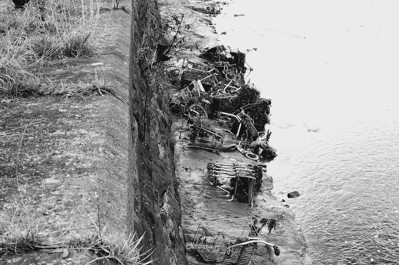 Some of the trolleys dumped in the River Lune at Lancaster which are an appalling eyesore, according to a local dog walker. Picture by Phil Taylor.
