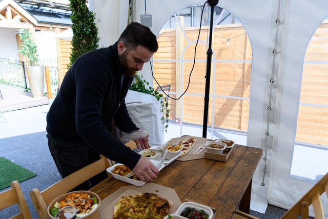 Isam Salah, founder of Misso Box, with some of the food prepared.