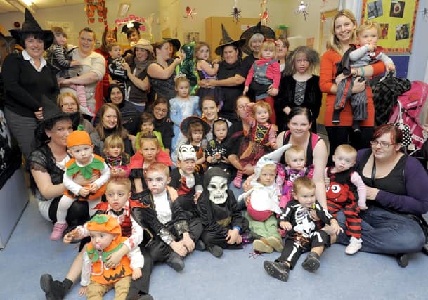 Witches and ghosts at a Balmoral Children's Centre, and Morecambe and Lancaster Home Start Halloween party.