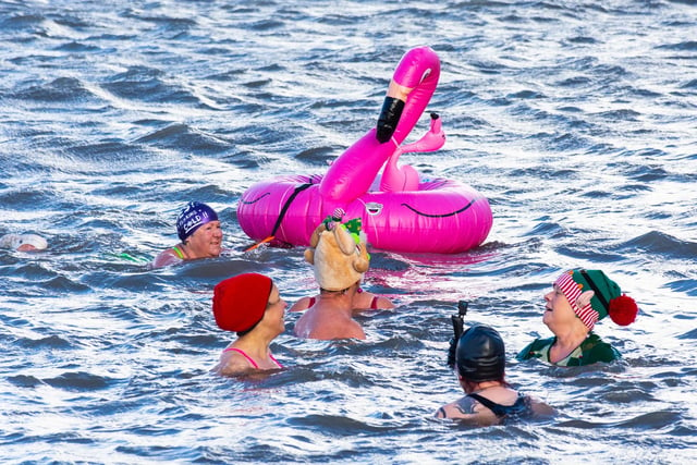 People immersed themselves in the water up to their shoulders for the Boxing Day Dip. Picture by Keith Douglas.
