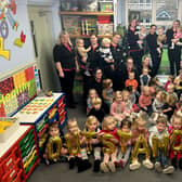 Staff and children celebrate their Ofsted result at Hornby Day Nursery.