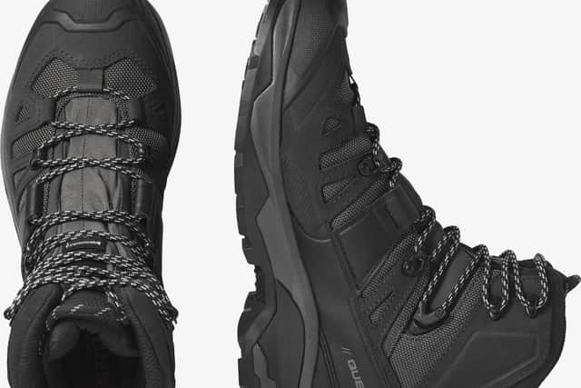 The man was wearing a pair of Salomon Quest 04 walking boots