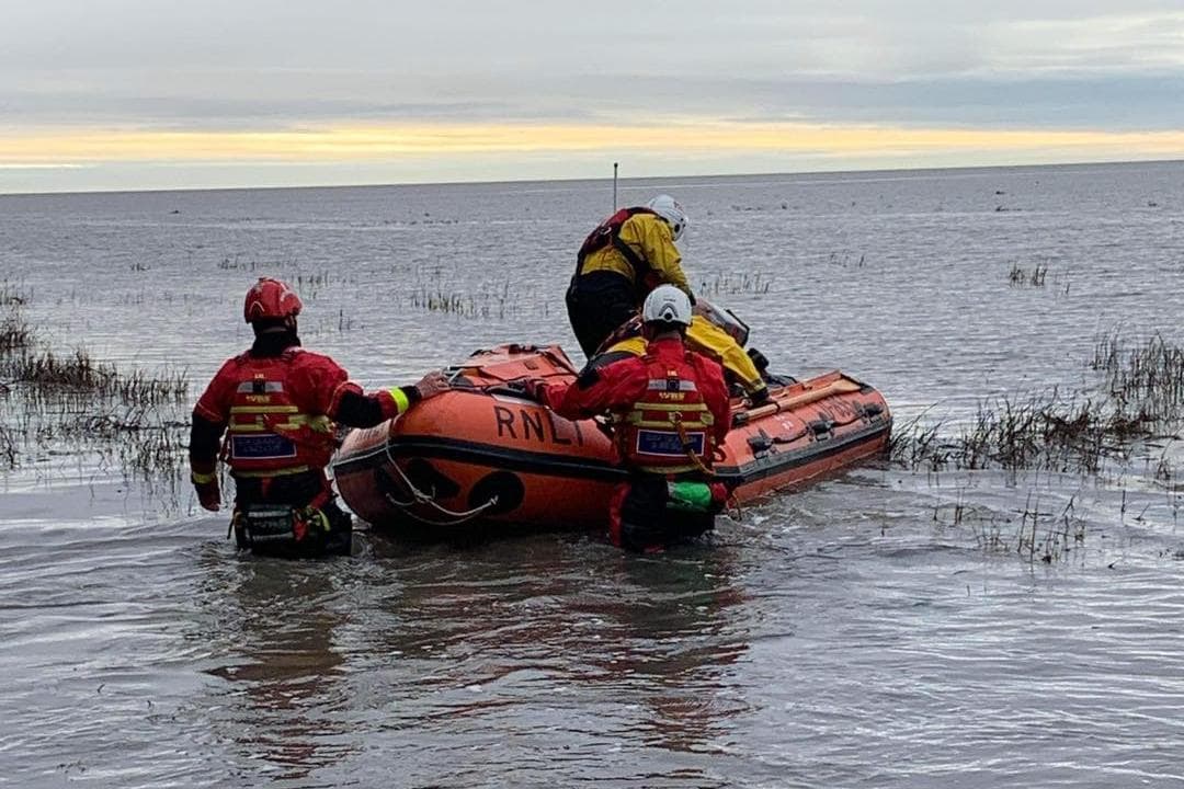 Person Rescuing Another Person Morecambe lifeboat help rescue two more people cut off by another ...