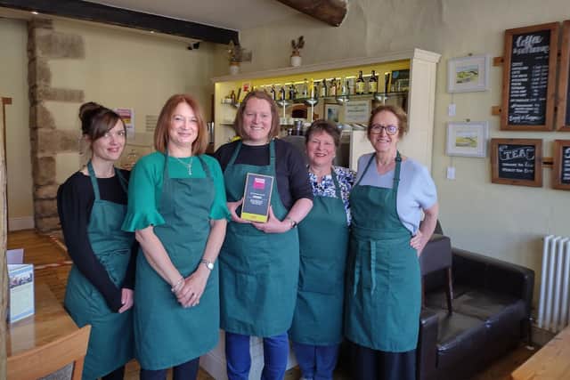 Members of The Folly Coffee House team with their award. From left: Amy Davies, Louise Constantine, Victoria Murray, Heather Murray and Freda Williamson. Photo by Caitlin Greenwood.