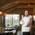 Chef patron Sean Wrest pictured in the conservatory dining area at Ye Horns Inn