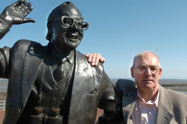 Mike Fountain pictured next to the Eric Morecambe statue in 2009.