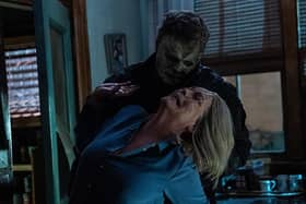 Michael Myers (aka The Shape) and Jamie Lee Curtis as Laurie Strode in HALLOWEEN ENDS, directed by David Gordon Green.
