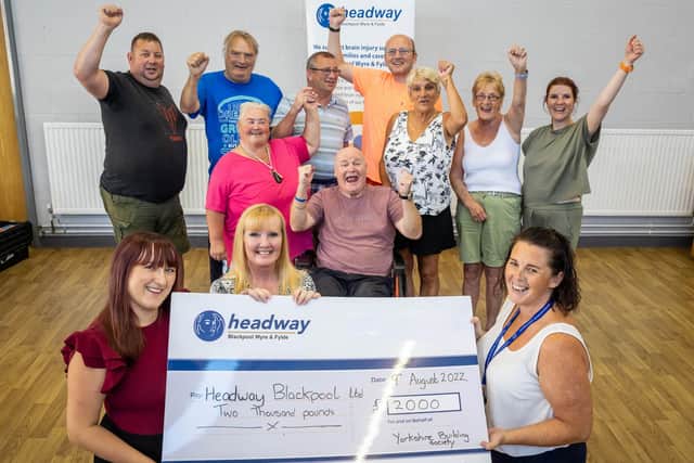 Vincents Solicitors’ Amy Whiteside with Lisa Nickson from the Garstang Agency branch of the Yorkshire Building Society, Headway’s Sam Ashcroft and local Headway members.