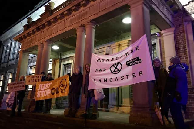 Protestors outside Morecambe Town Hall before the council meeting.