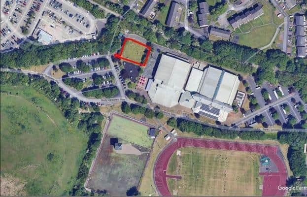 An aerial photo of Salt Ayre Leisure Centre with the planned location of the padel courts highlighted in red.