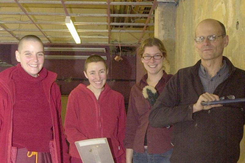 Members of a new Buddhist centre in Lancaster help the builders in their attempt to get the building open on time. From left: Kelsang Chokga, Kelsang Wangmo, Jill Bateson and Dave Jones.