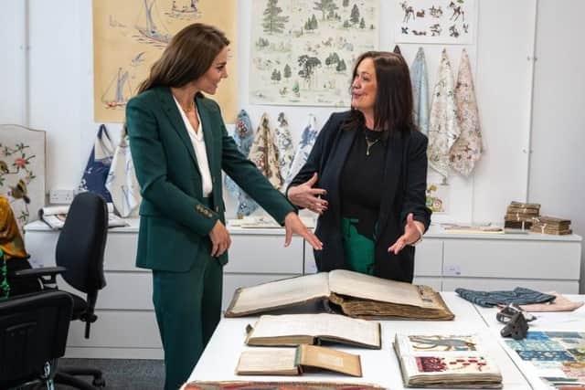 Emma Douglas showing The Princess of Wales Standfast & Barrack’s fascinating, historical ledgers. Picture Kelvin Lister-Stuttard.