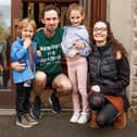 Michael with wife Elise and children Charlie and Emma before setting off on his run. Photo by Mike Coleran