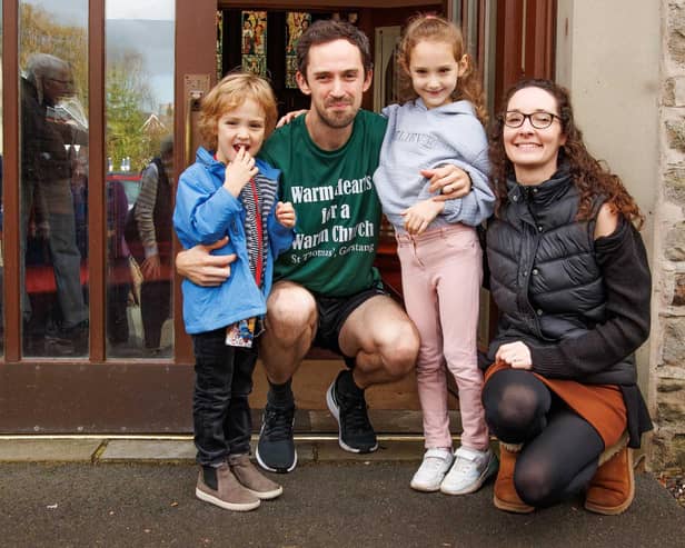 Michael with wife Elise and children Charlie and Emma before setting off on his run. Photo by Mike Coleran