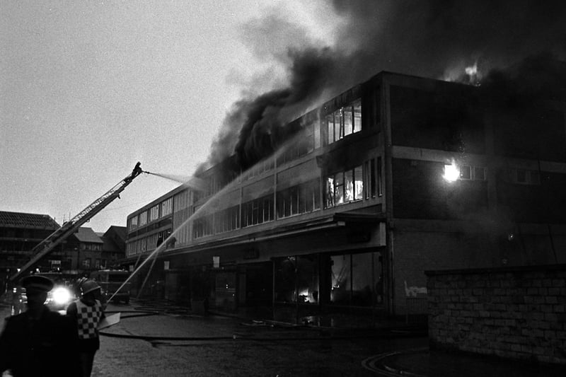 Firefighters at the scene of the fire which devastated the market.