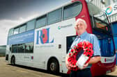 Steve Trainor, a bus driver for Stagecoach in Morecambe, with the Poppy Bus supporting Armed Forces Day at the depot in Carlisle. Photo by Jenny Woolgar Photography