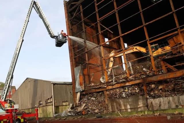 The fire in Lancaster burned for three weeks before being brought under control. Firefighters are still being called to the scene as waste removal teams uncover pockets of fire.